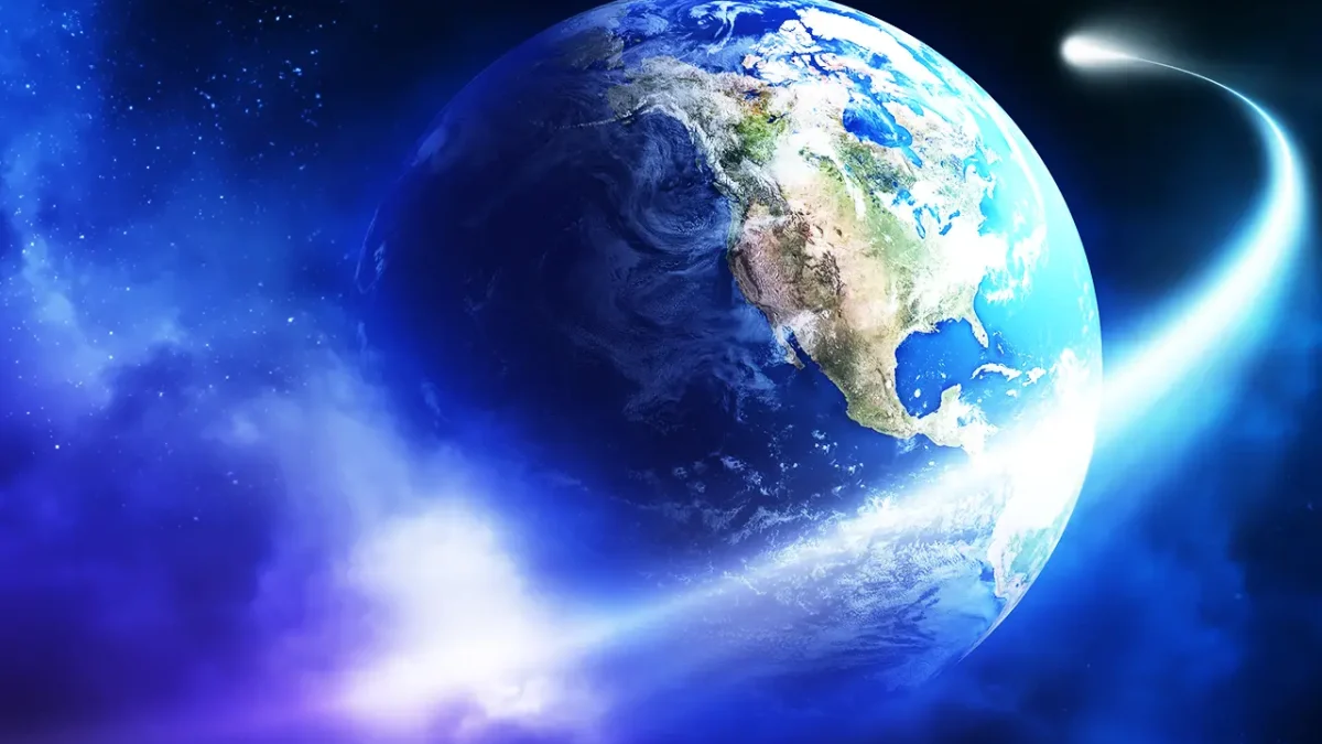 Earth and comet in space; a cosmic experiment.