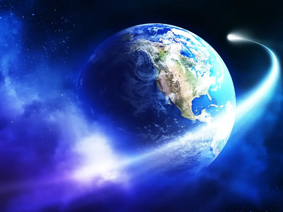 Earth and comet in space; a cosmic experiment.